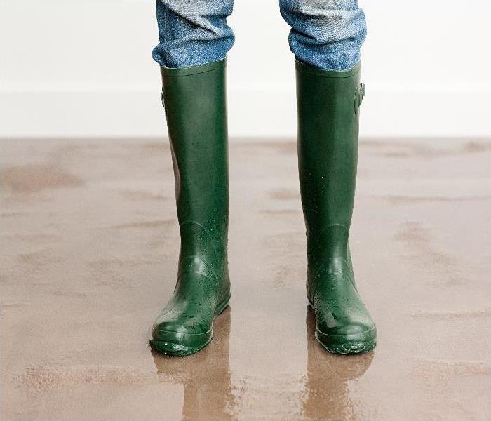 wellington boots on flooded floor