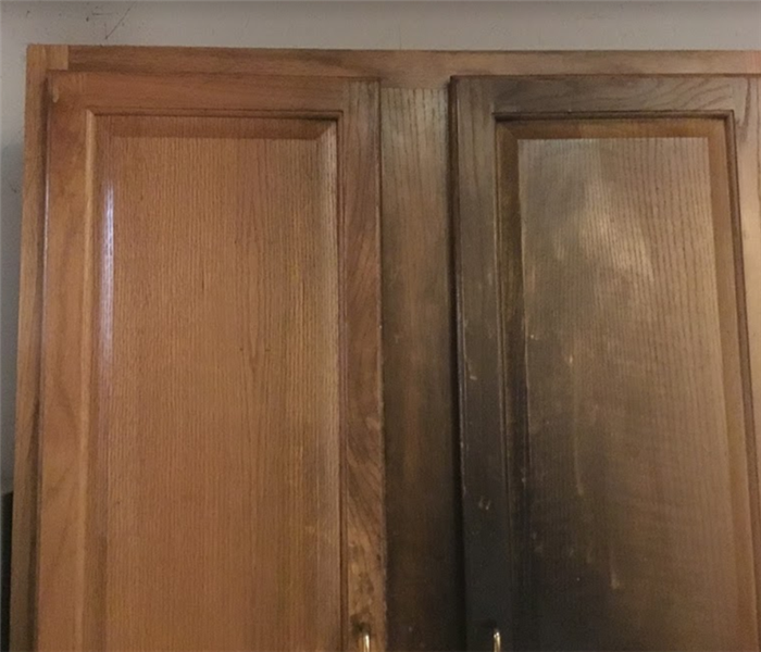 charred and smoke damaged upper cabinets